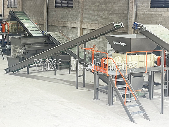 Industrial tire shredding machinery setup